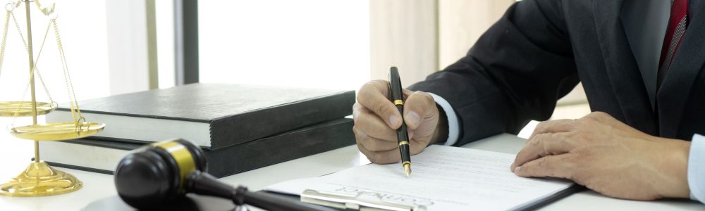 cropped-image-hand-with-open-book-table