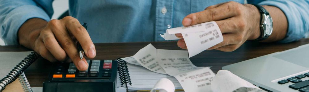 midsection-accountant-working-table