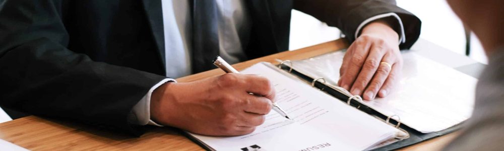 midsection-businessman-taking-interview